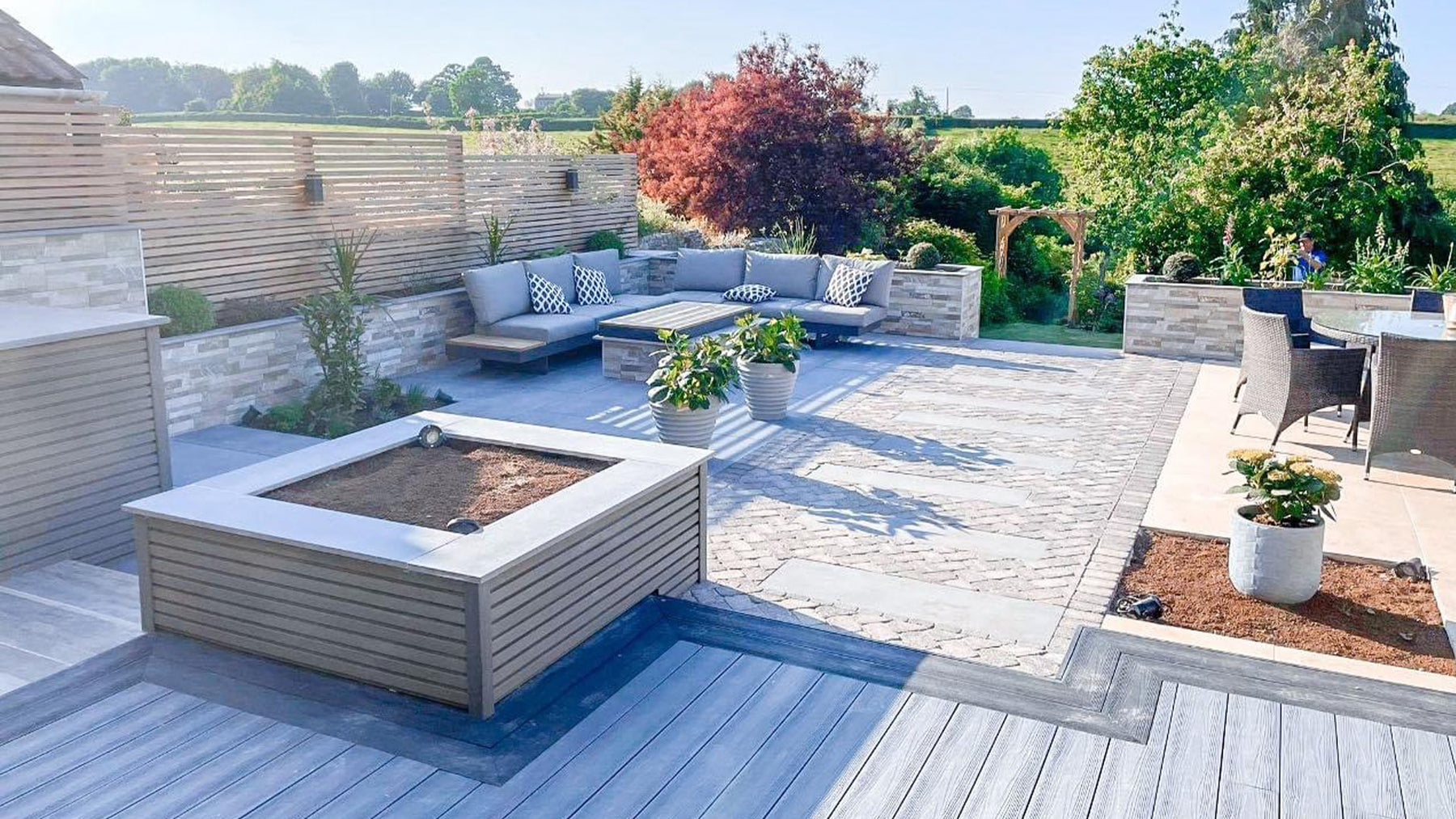 Light grey wood plastic composite decking in garden