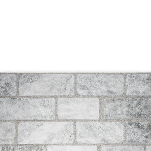 An example of a section of Cavo Porcelain Cladding. The colour is a darkish grey with a marbled effect.