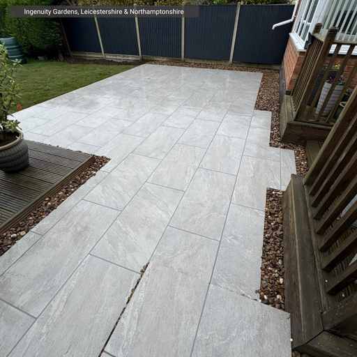 Select Living Group Cristallo Beige Porcelain Paving patio steps and garden area.