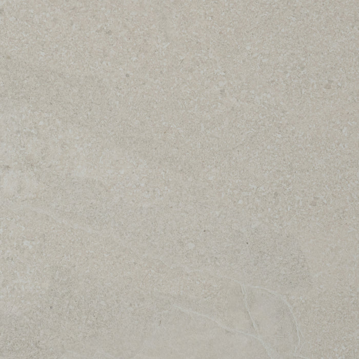 A close up of a beige Saltoro porcelain paving slab.