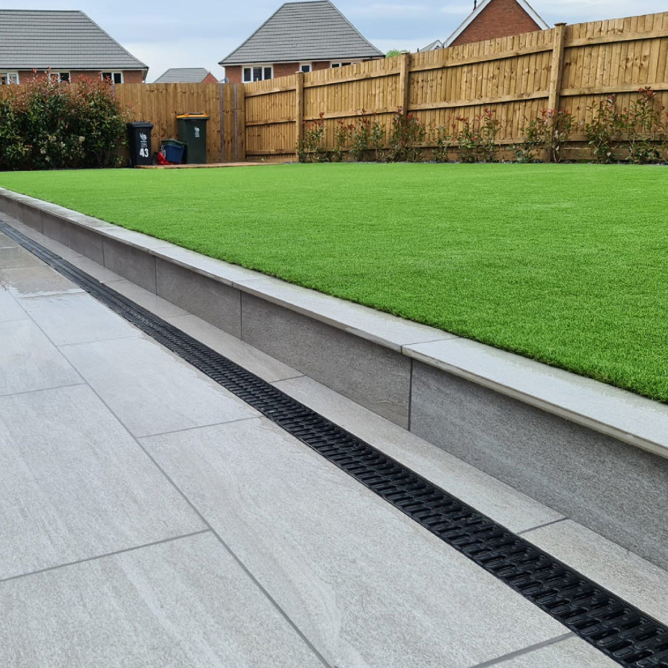 Garden scene with Trafford Artificial Grass from Select Living Group.