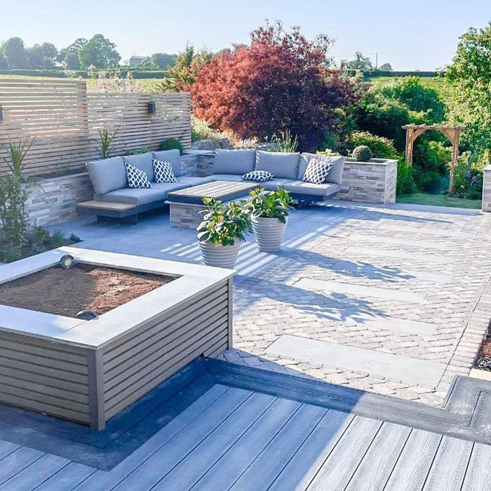 Light grey wood plastic composite decking in garden