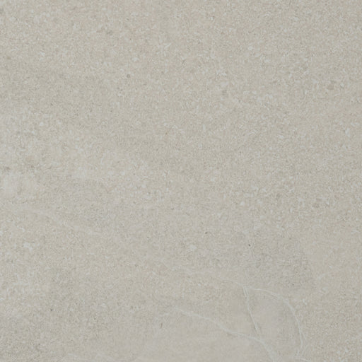 A close up of a beige Saltoro porcelain paving slab. 