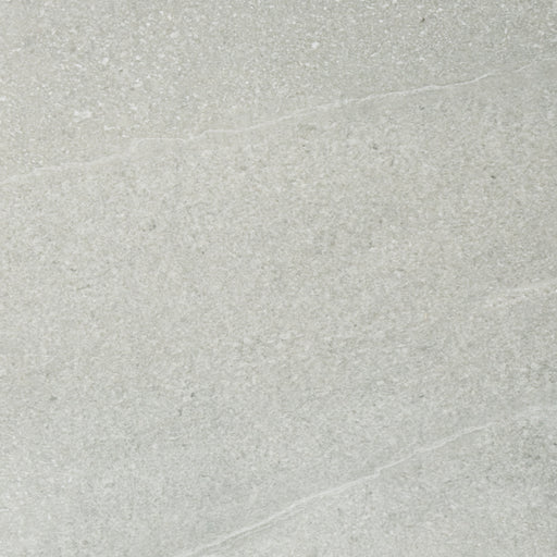 A close up of a light grey Saltoro porcelain paving slab. 