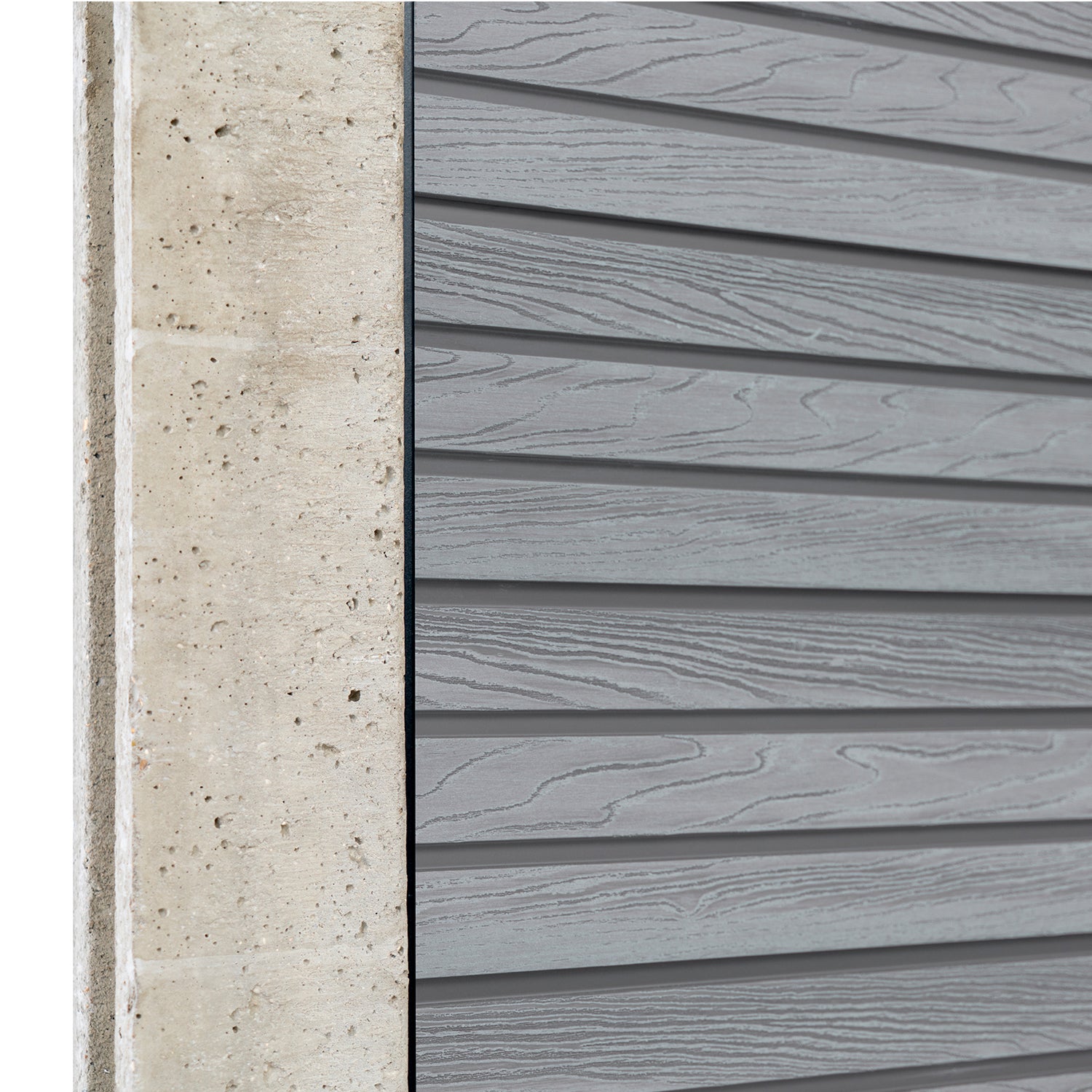 Select Living Group composite fencing angled close up product shot, Light Grey Slatted fence panel with Concrete posts