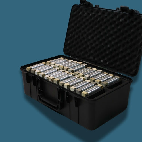 Black protective case with foam lining containing porcelain samples from Select Living Group on a blue background