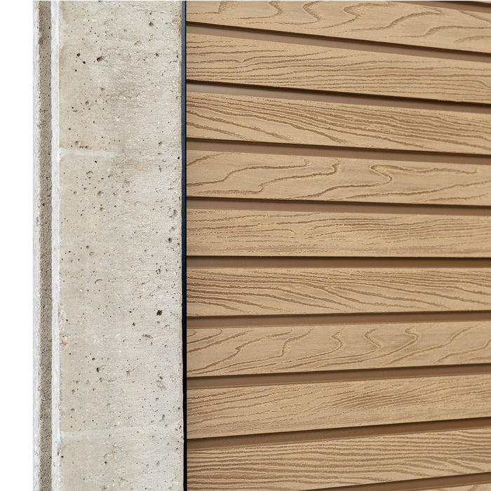 Select Living Group composite fencing angled close up product shot, Teak Slatted fence panel with Concrete posts